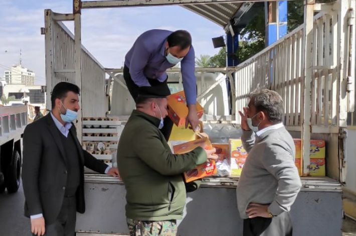 The host restaurant of the al-Abbas's (p) Holy Shrine distributes hundreds of meals to the security forces in charge of implementing the preventive curfew.